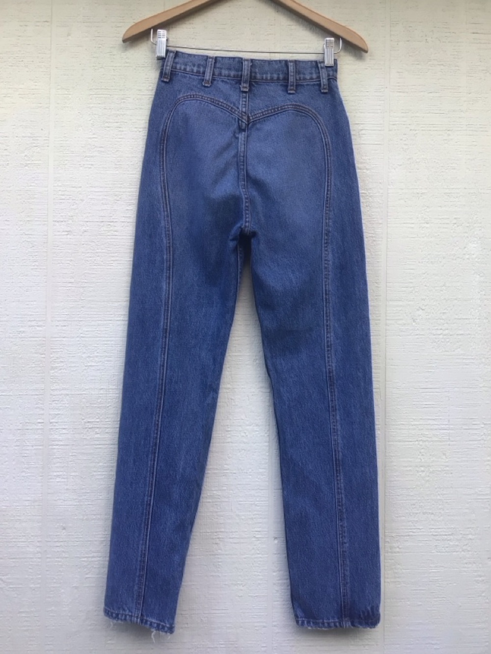Reformation Saddle jean in Sydney heart shaped back